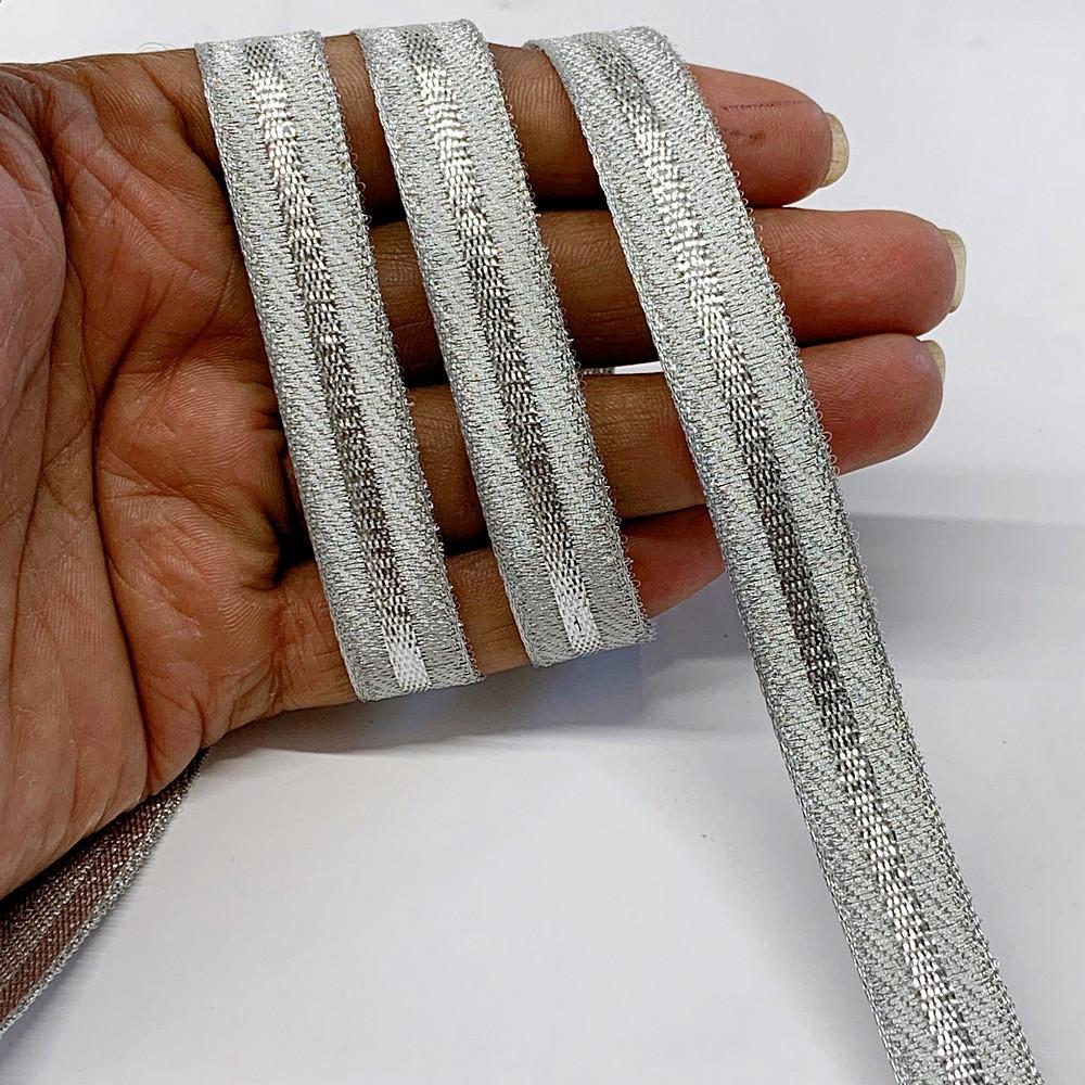 14 mm Thick Gold Metallic Zari Ribbon with Shiny Stripe, shown on white cotton