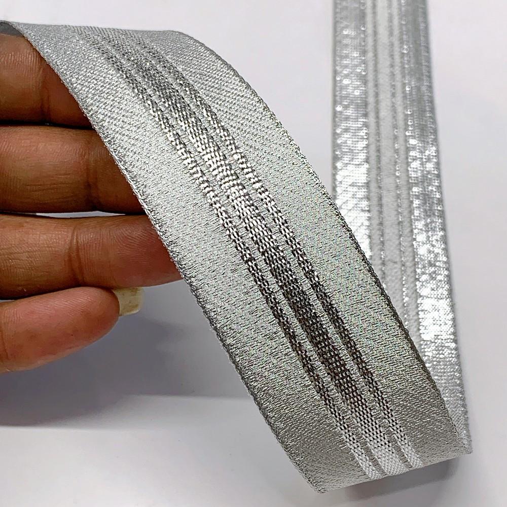 32 mm Thick Gold Metallic Zari Ribbon with Shiny Stripe, shown on white cotton