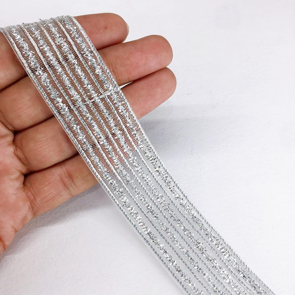 34 mm Sheer Ribbon with 9 line Glitter Shiny Metallic Thread, shown on white cotton