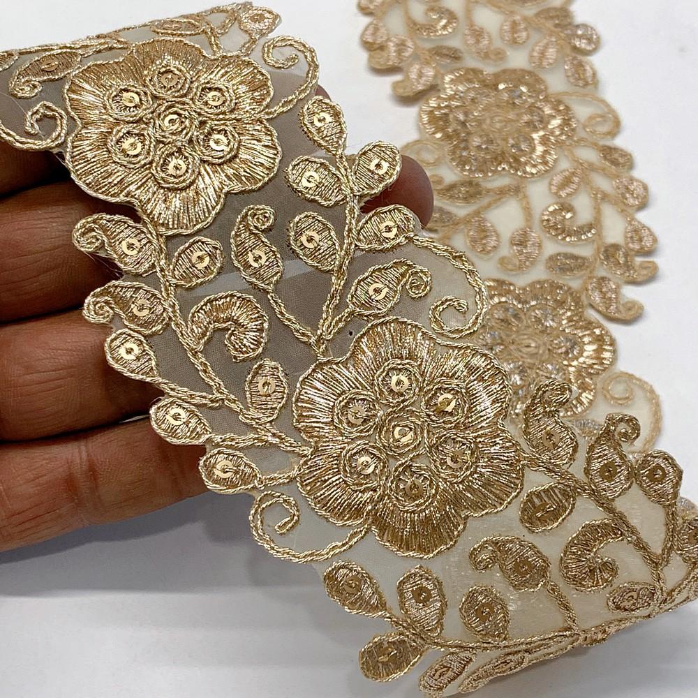 56mm Designer Flower Cutwork Embroidery Lace With Sequins And Dori work, shown on white cotton