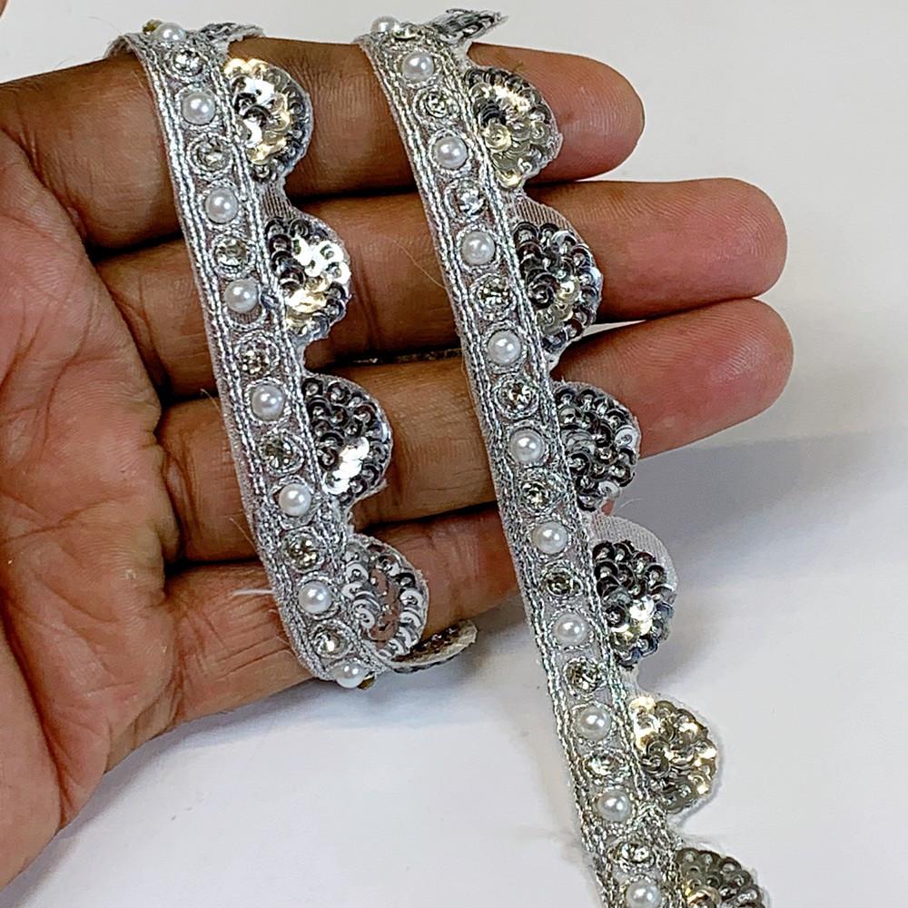 16mm Designer Cutwork Sequins Embroidery Lace With Stones And Dori Work, shown on white cotton