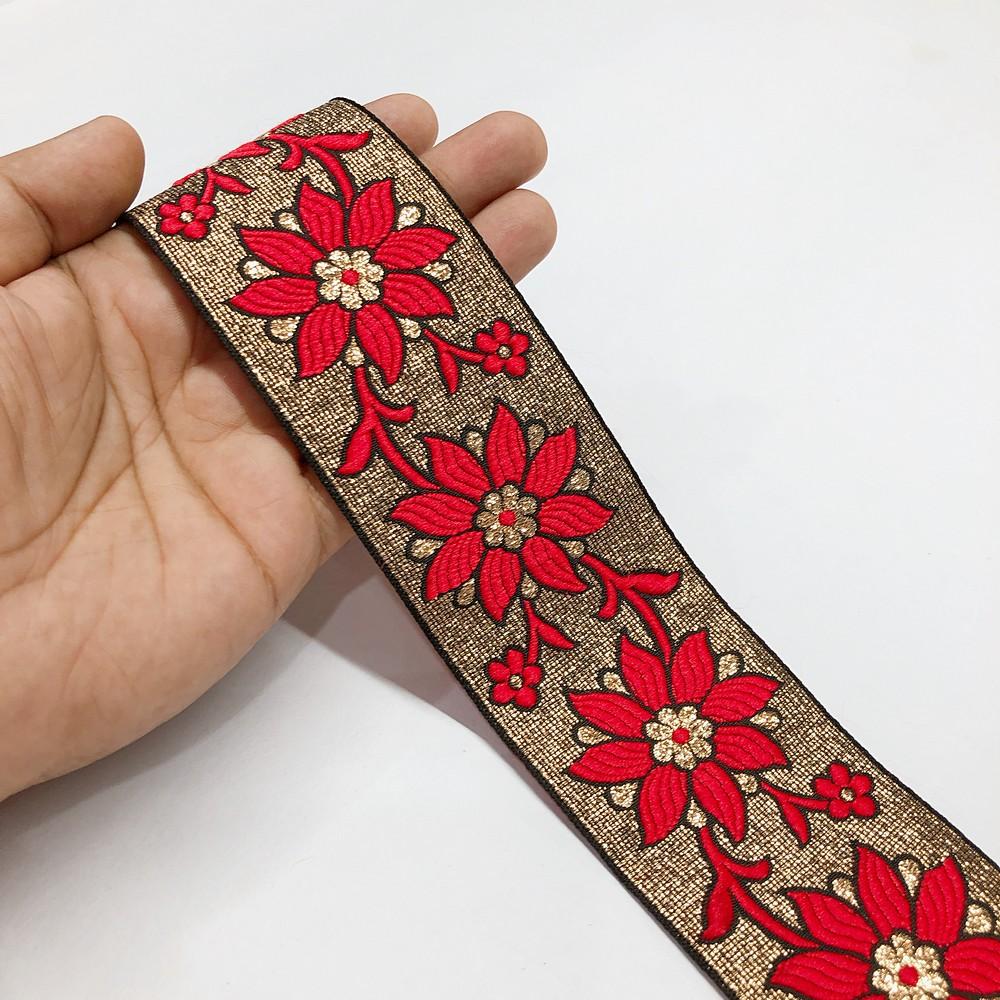 55mm Flower Design Jacquard Ribbon, shown on white cotton