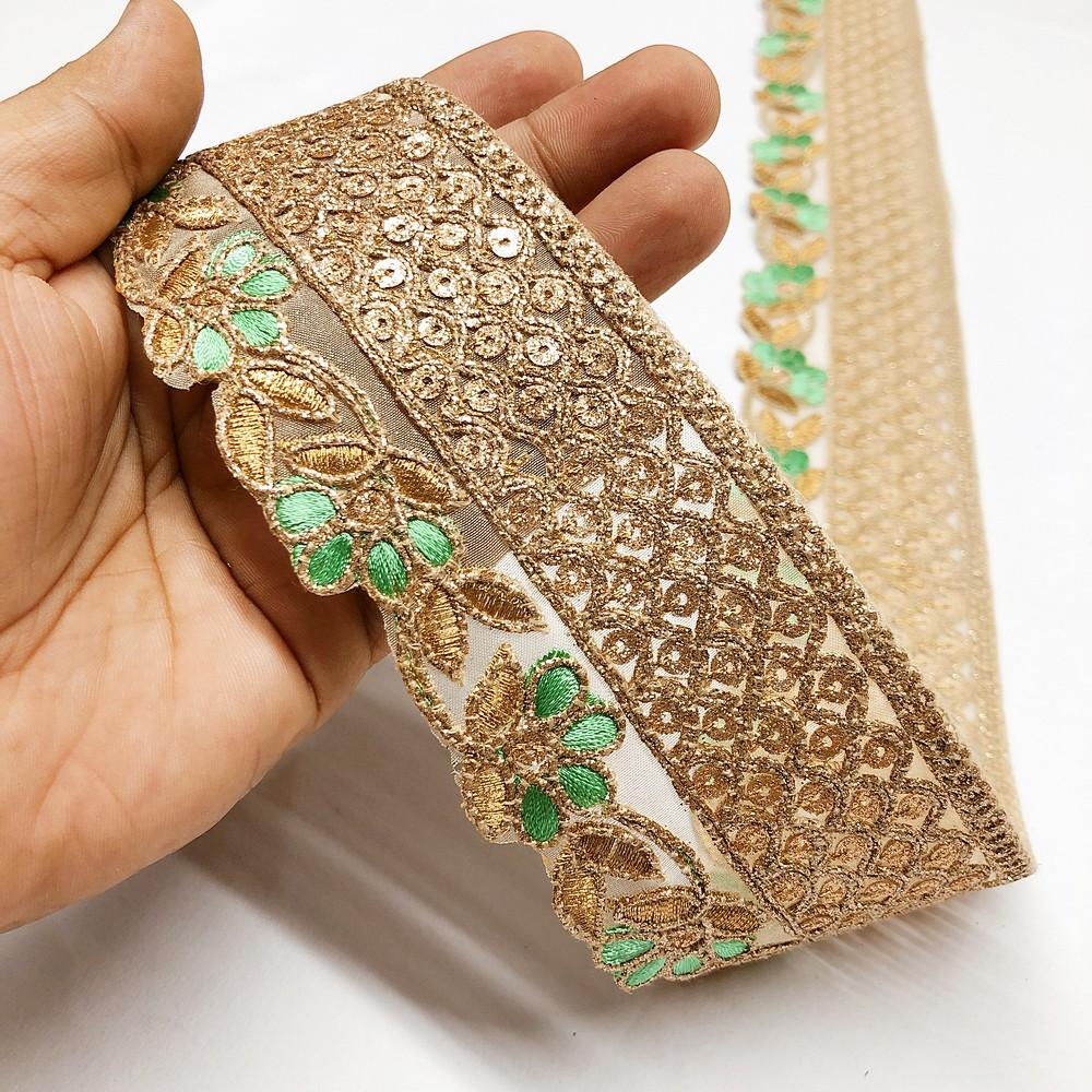 60mm Flower Design Cutwork Embroidery Lace With Sequins And Dori Work, shown on white cotton