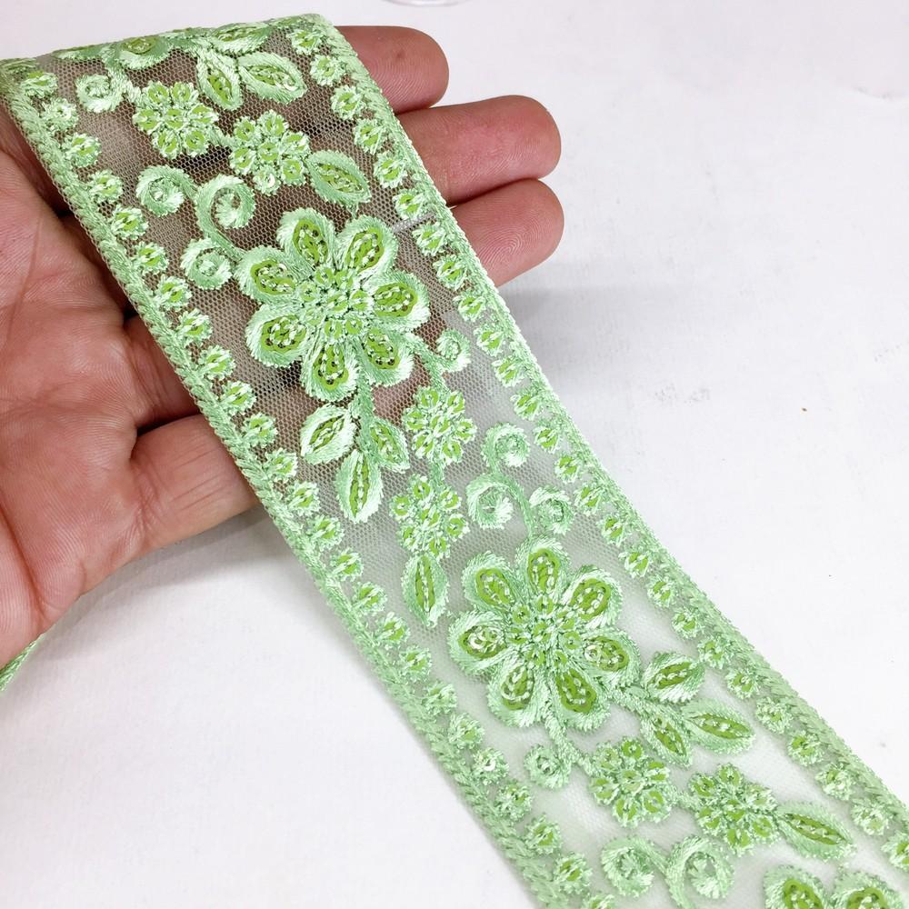 52 mm Flower Design Colour Cotton Thread Embroidery Lace With Sequins Work, shown on white cotton