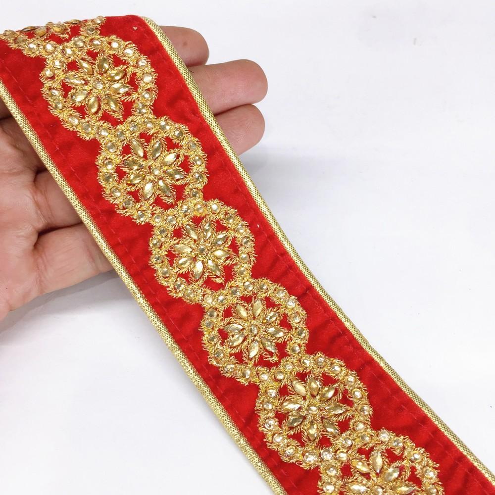 44 mm Designer Embroidery Lace With Stone And Golden Piping, shown on white cotton