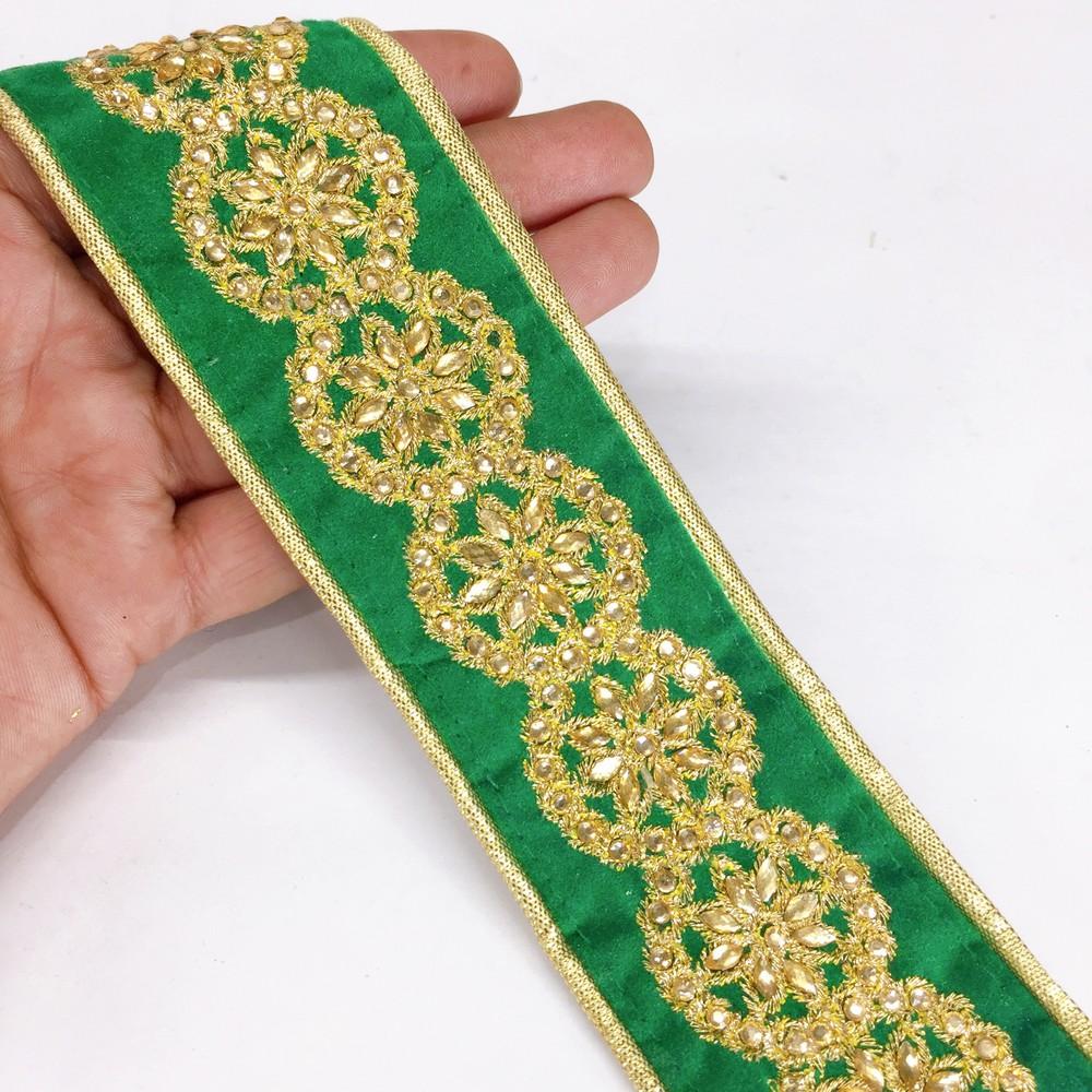 44 mm Designer Embroidery Lace With Stone And Golden Piping, shown on white cotton