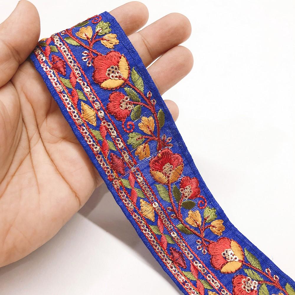 50mm Designer Embroidery Lace With MultiColour Threads And Sequins Work, shown on white cotton