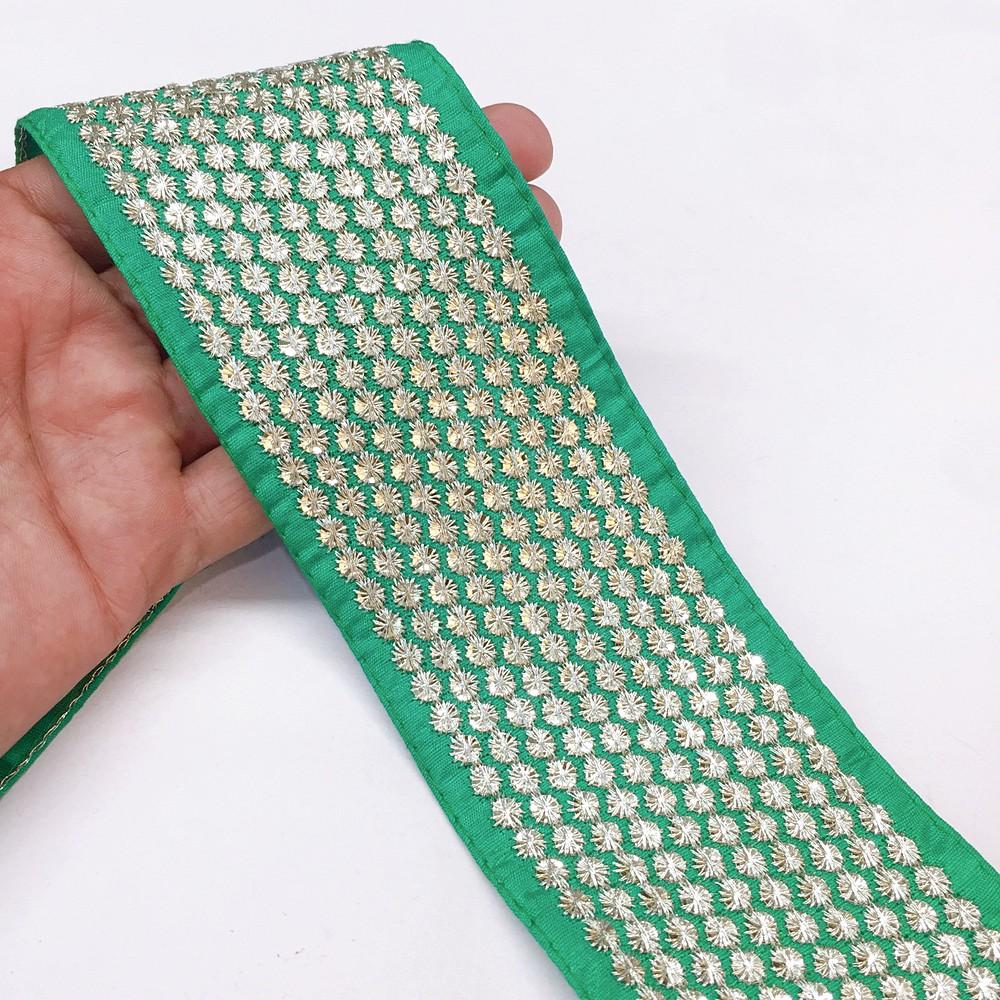 68 mm Star Design Embroidery Lace, shown on white cotton