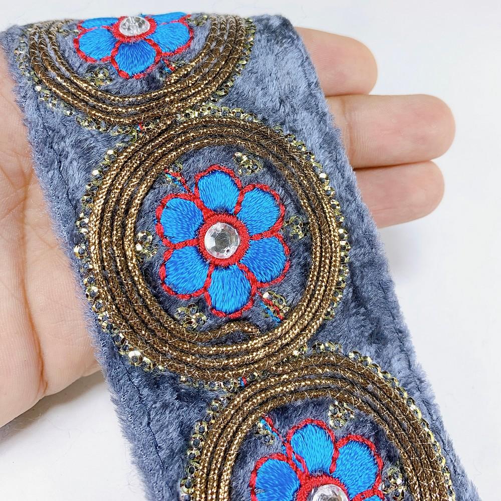 55mm Designer Velvet Embroidery Lace With Sequins work, shown on white cotton