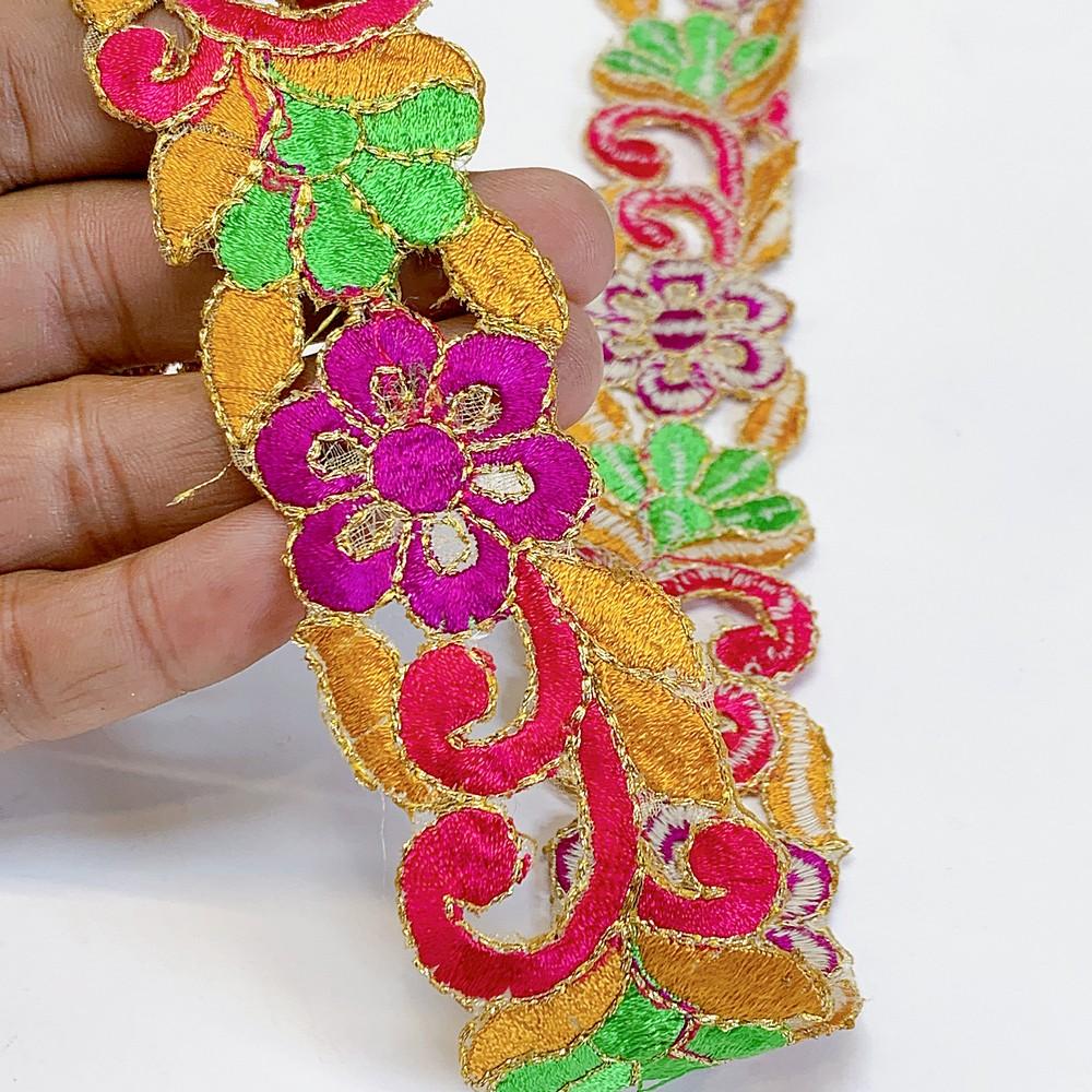 25mm Designer Cutwork Embroidery Lace, shown on white cotton