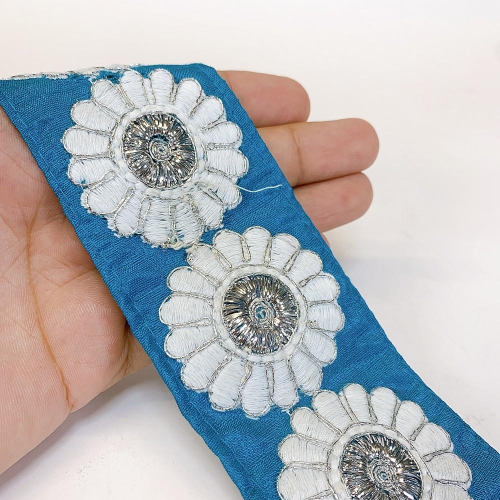 55mm Designer Flower Embroidery Lace With Dori Work, shown on white cotton