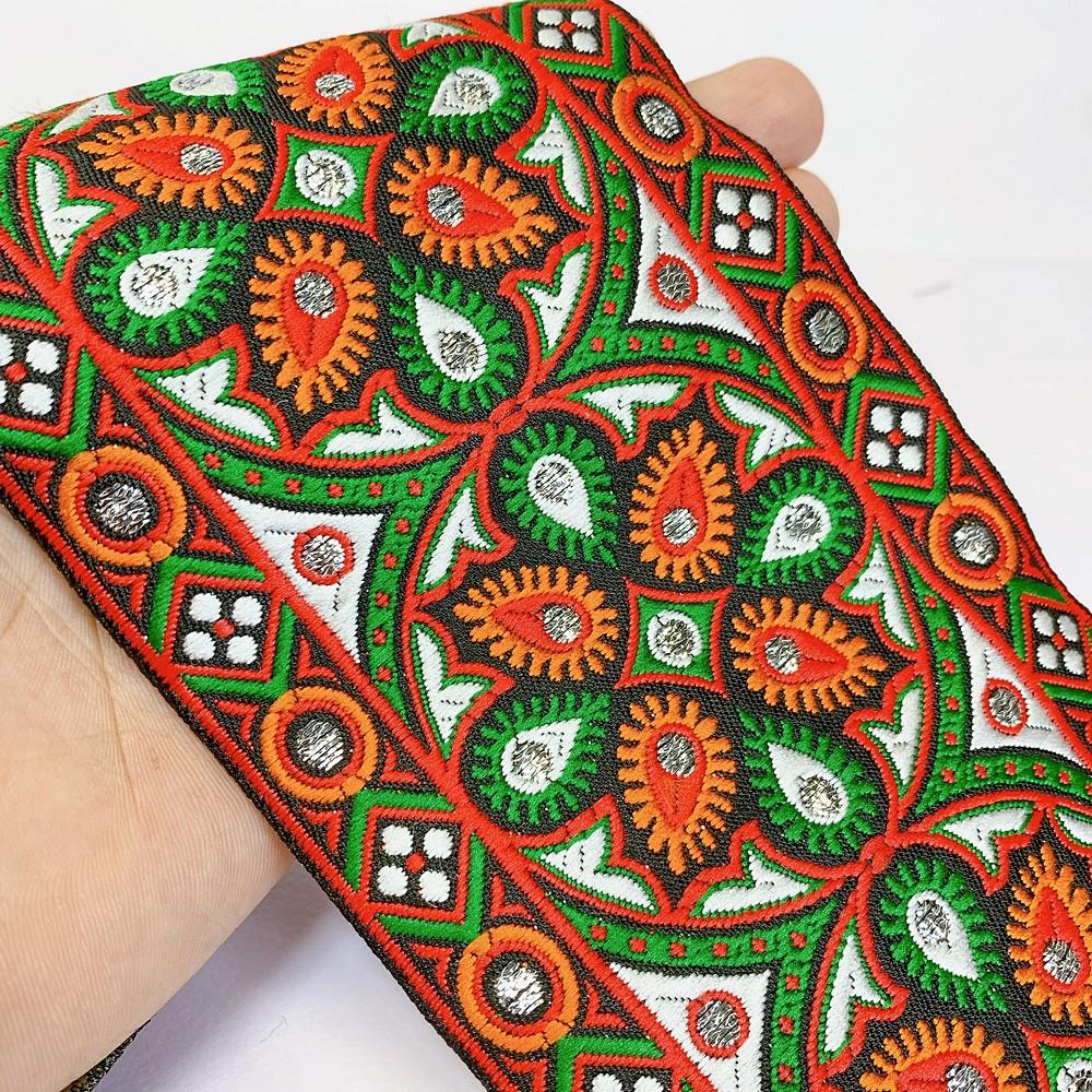 100mm Kutchi Design Jacquard Lace With Zari Work, shown on white cotton