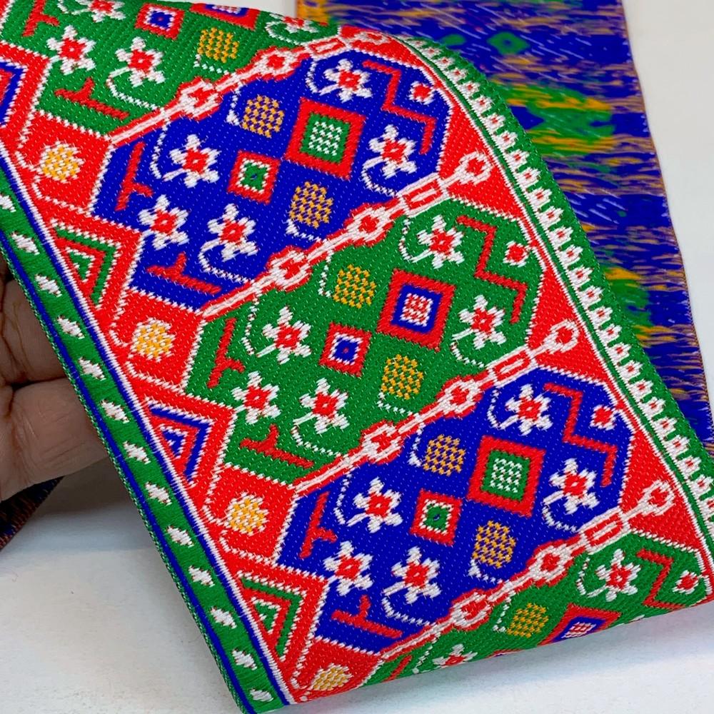 100mm Colorful Cross stich Jacquard Lace, shown on white cotton