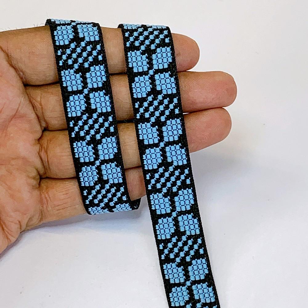 20mm Colorful Cross stich Jacquard Lace, shown on white cotton