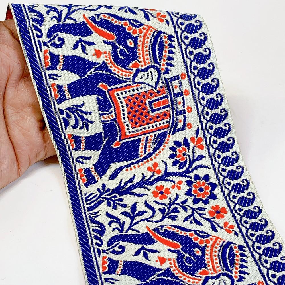 100mm Elephant Design Banarasi Jacquard Lace, shown on white cotton