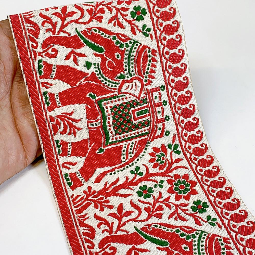 100mm Elephant Design Banarasi Jacquard Lace, shown on white cotton