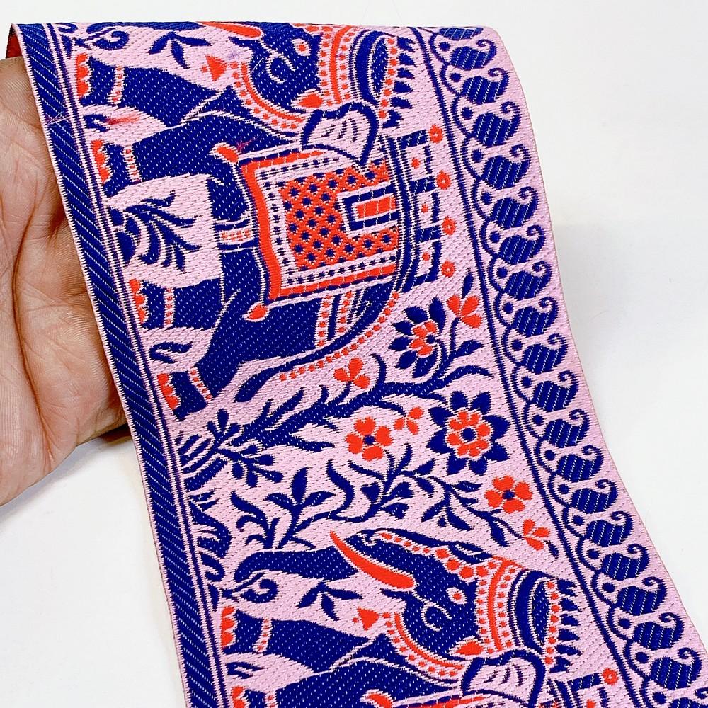 100mm Elephant Design Banarasi Jacquard Lace, shown on white cotton