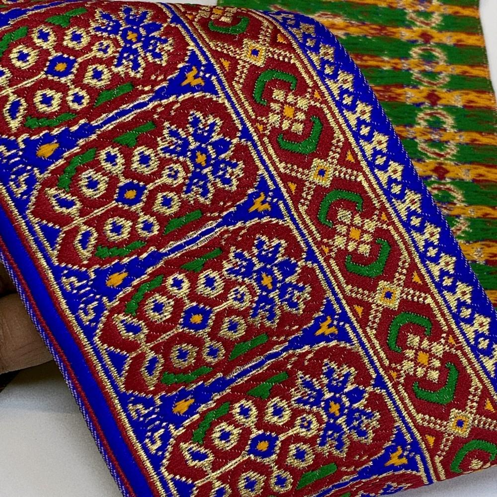 96 mm Colorful Cross stitch Jacquard Lace With Jari Work, shown on white cotton