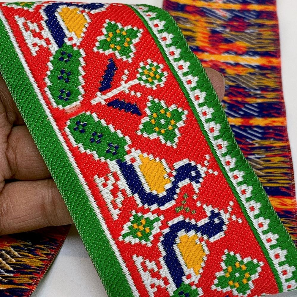 66 mm Colorful Traditional Peacock Design Cross stitch Jacquard Lace, shown on white cotton