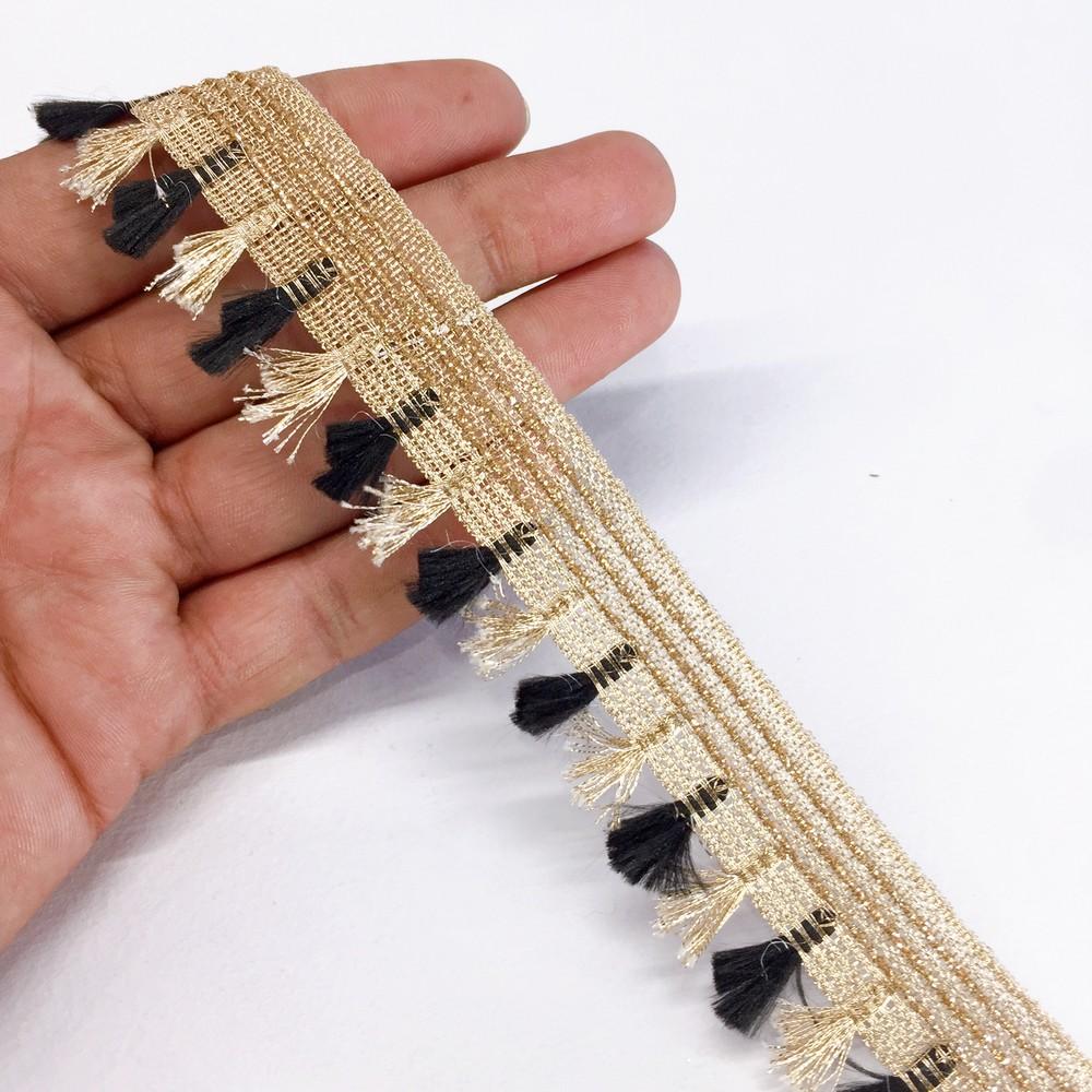 25mm Crochet Knitted Decorative Ribbon, shown on white cotton
