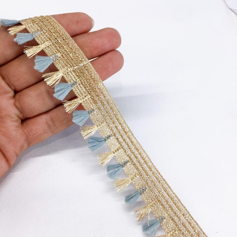 25mm Crochet Knitted Decorative Ribbon, shown on white cotton
