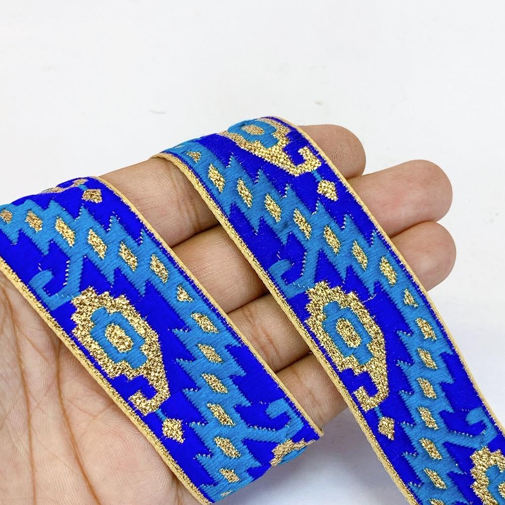 30mm Designer Jacquard Lace With Golden Zari Thread Work, shown on white cotton