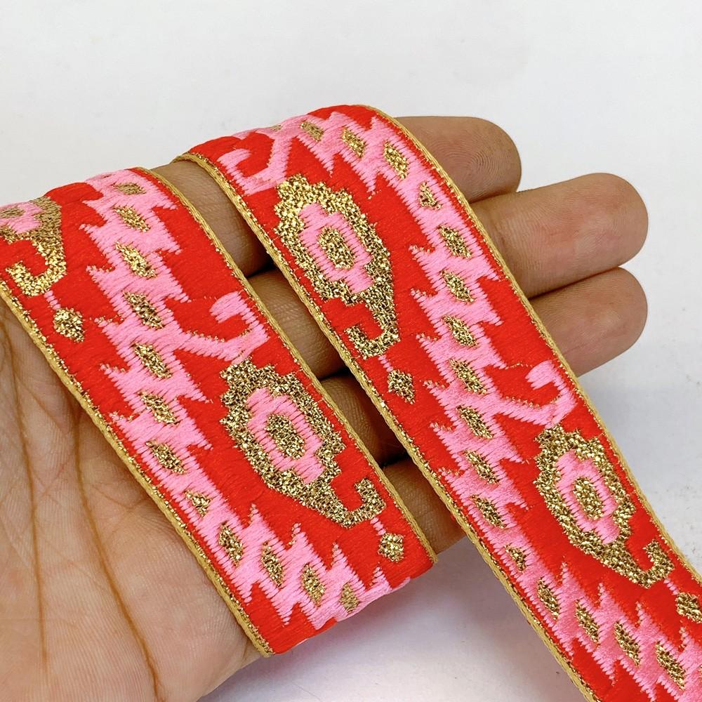 30mm Designer Jacquard Lace With Golden Zari Thread Work, shown on white cotton
