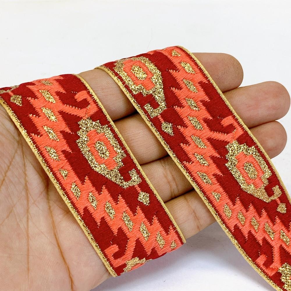 30mm Designer Jacquard Lace With Golden Zari Thread Work, shown on white cotton