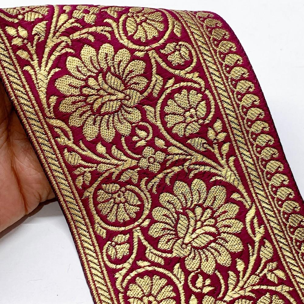 100mm Designer Foral Golden Banarasi Lace, shown on white cotton
