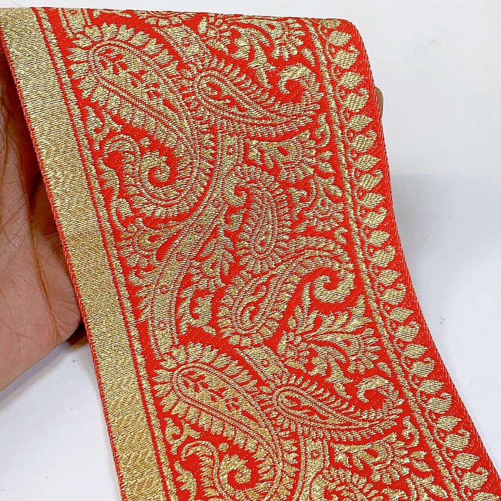 100mm Designer Foral Golden Banarasi Lace, shown on white cotton