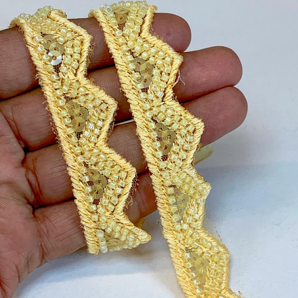 20mm Designer Beads and Sequins Embroidery Lace, shown on white cotton