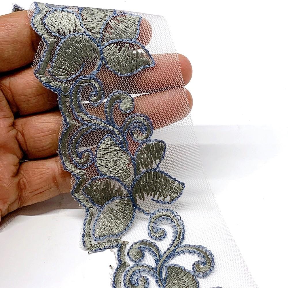 48 mm Designer Cutwork Embroidery Lace, shown on white cotton