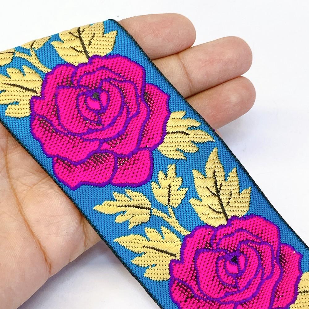 58 mm Rose Design Colourful Jacquard Ribbon, shown on white cotton