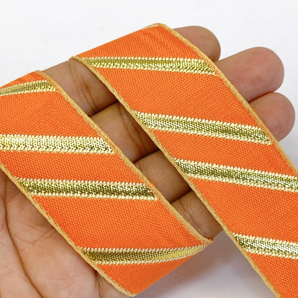 25mm Designer Jacquard Ribbon With Zari Threads, shown on white cotton