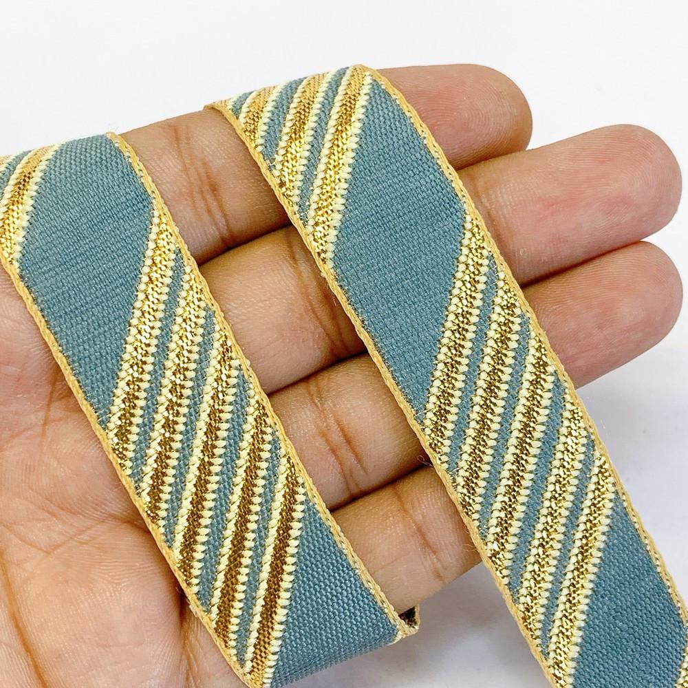 20mm Designer Jacquard Ribbon With Zari Threads, shown on white cotton