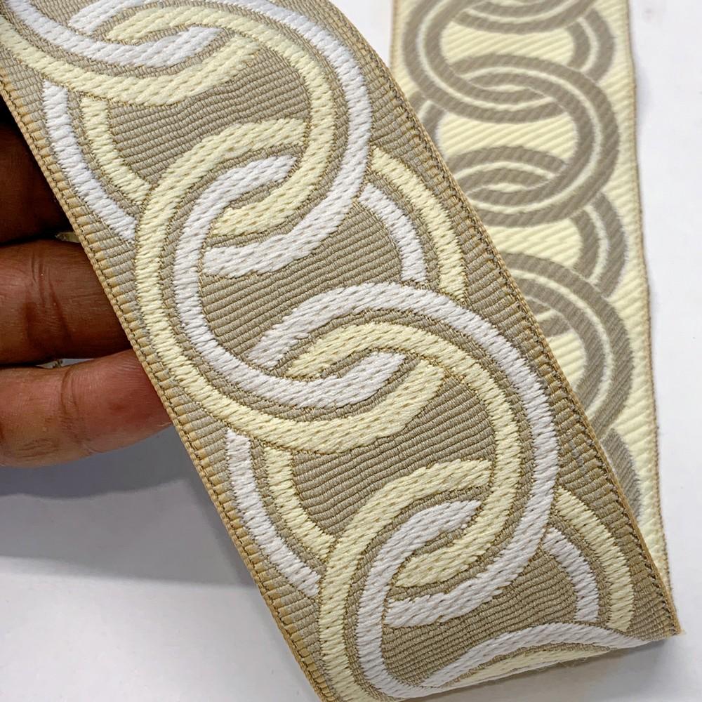 55mm Elegant Tapestry Tape with Braided Chain Design, shown on white cotton