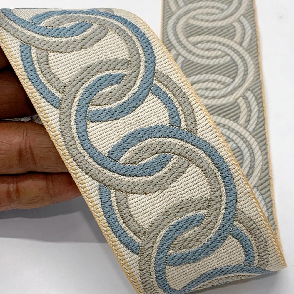 55mm Elegant Tapestry Tape with Braided Chain Design, shown on white cotton