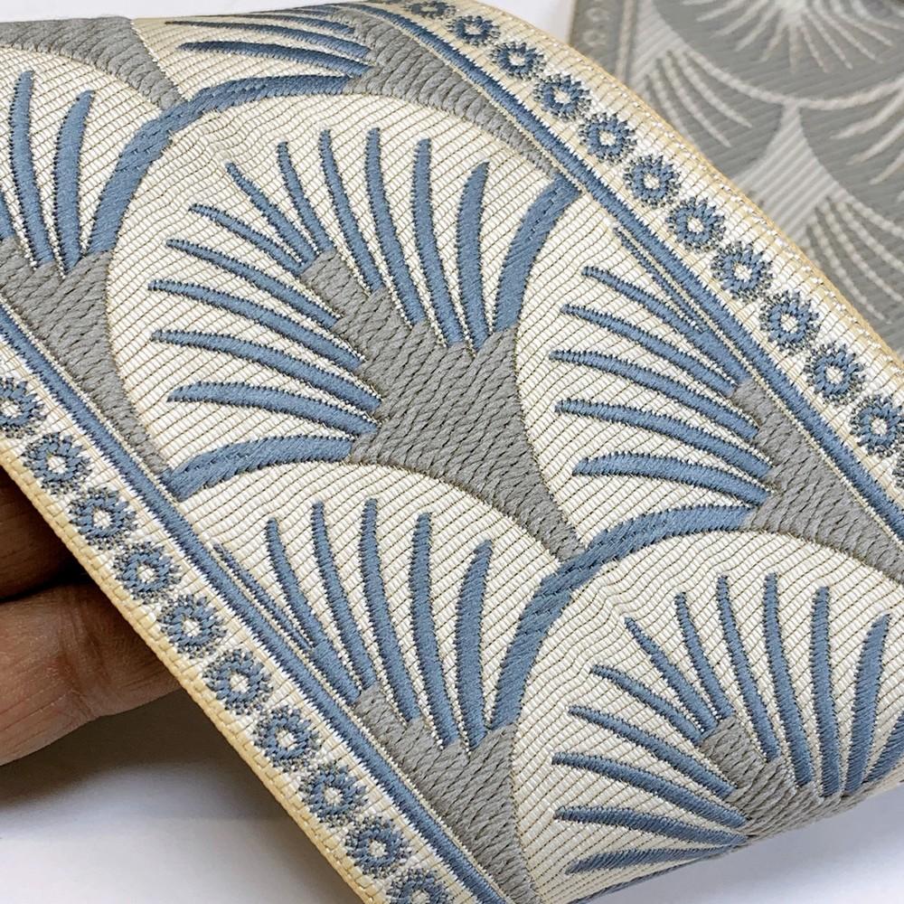90mm Art Deco Palm Tapestry Tape, shown on white cotton