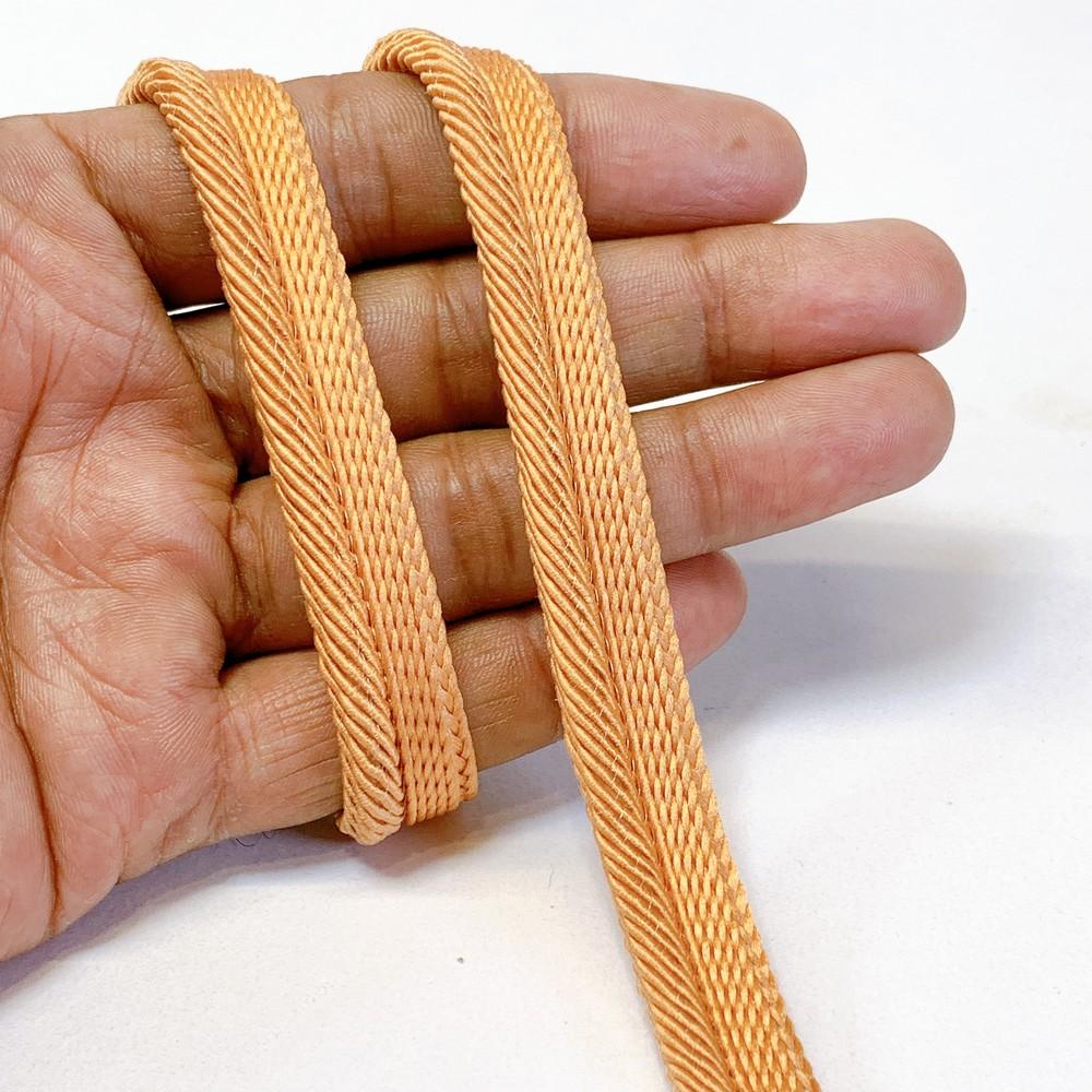 12mm Braided Home Furnishing Piping, shown on white cotton