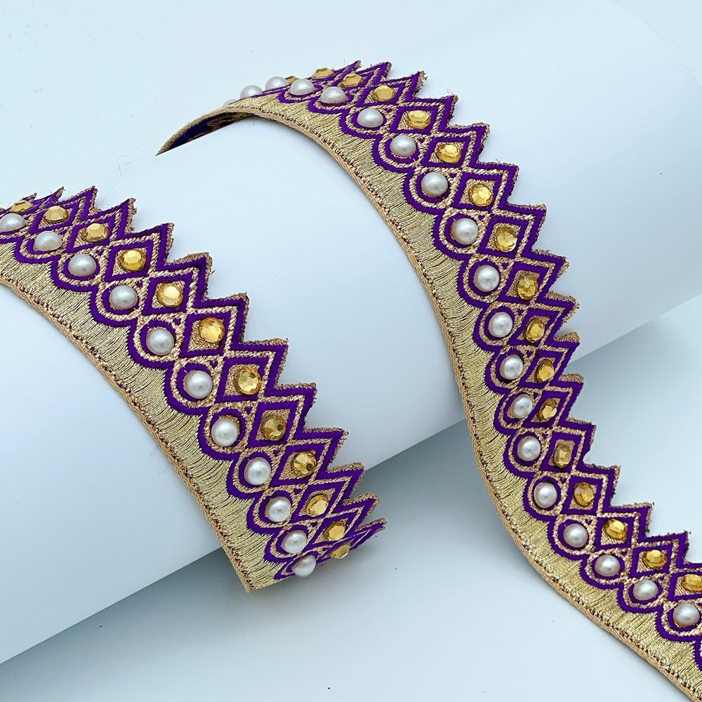 25mm Elegant Pearl & Mirror Embroidered Lace, shown on white cotton