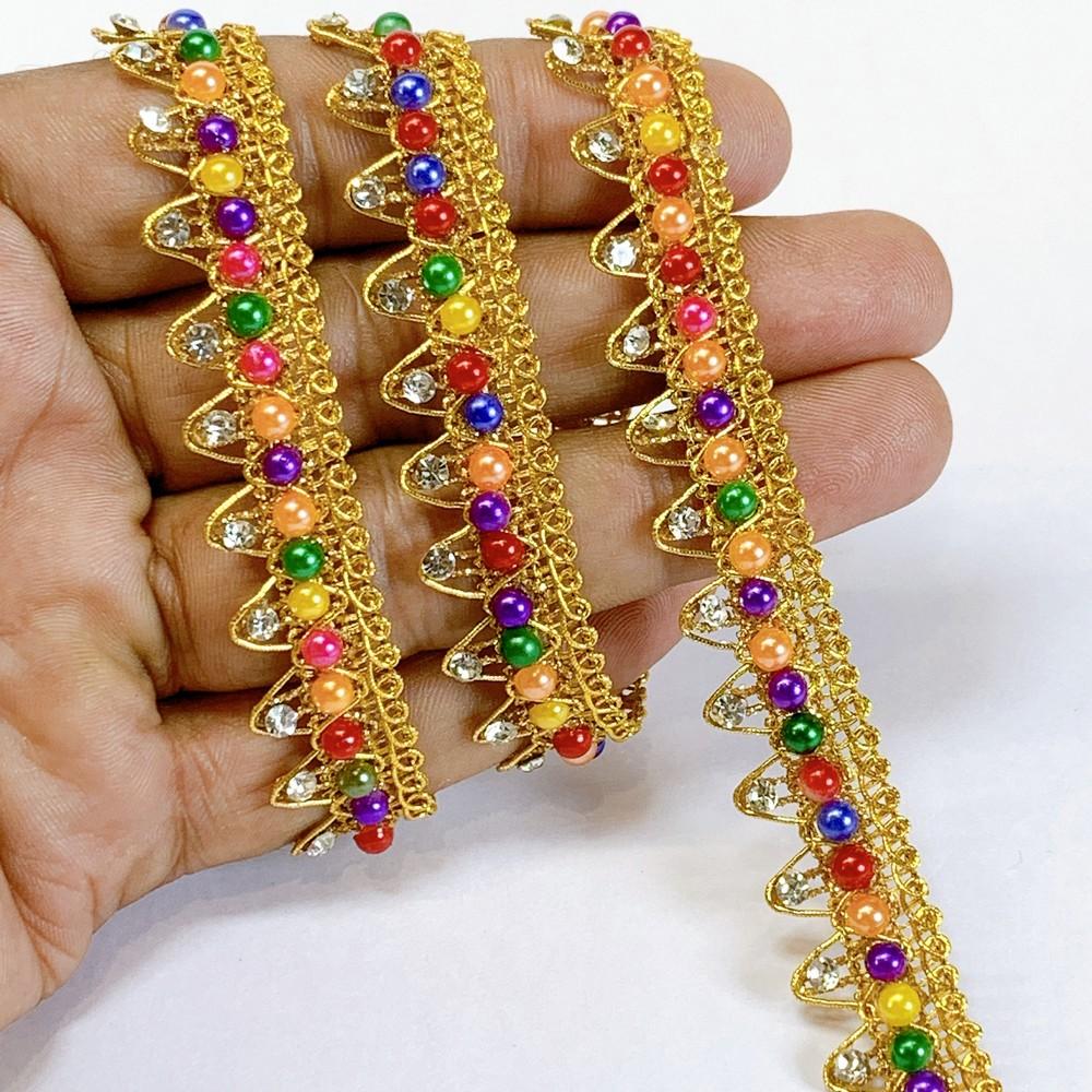 14mm Colorful Pearl and Stone Work Golden Crochet Lace, shown on white cotton