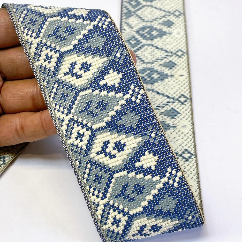 52mm Premium Cross-Stitch Jacquard Ribbon - Ethnic Geometric Border Lace for Garments & Crafts, shown on white cotton