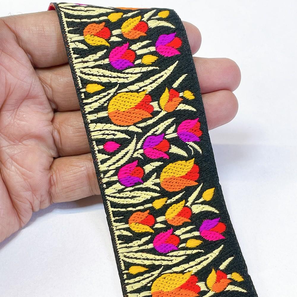 48mm Woven Jacquard Tulip Ribbon | Floral Garden Ethnic Trim | 1.9-Inch Multi-Color Jacquard Border for Boutique Fashion, shown on white cotton
