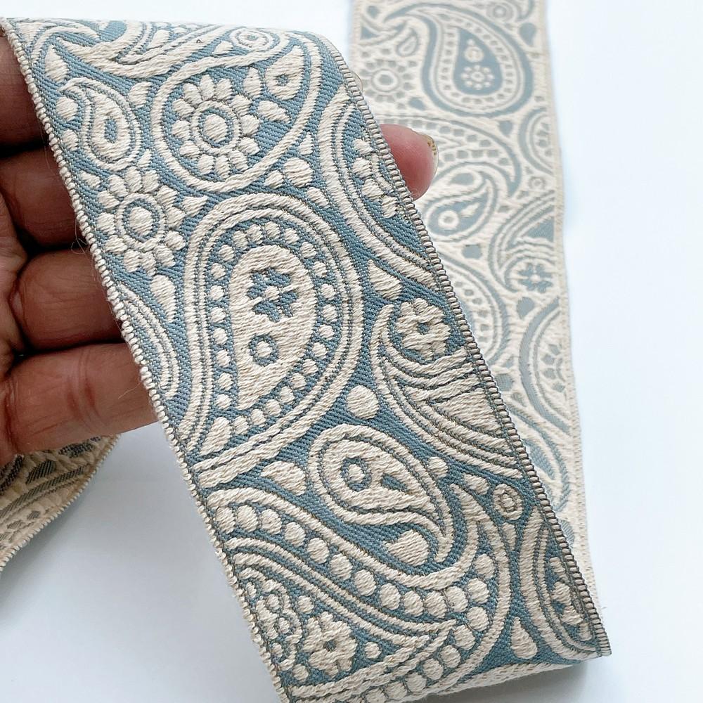 55mm Wide Traditional Paisley Motif Lace Border for Sewing, Garments, DIY Crafts & Home Decor, shown on white cotton