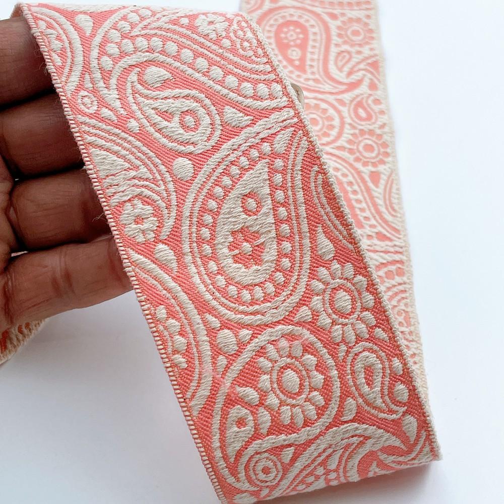 55mm Wide Traditional Paisley Motif Lace Border for Sewing, Garments, DIY Crafts & Home Decor, shown on white cotton