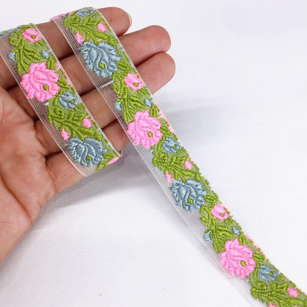 20mm flower creeper vine trim, shown on white cotton