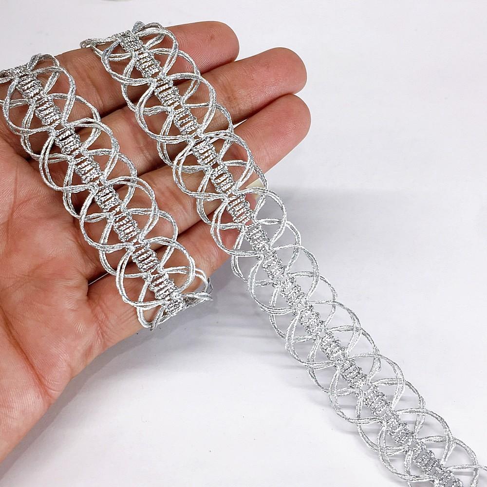 20mm Knitted Decorative Tape Ribbon, shown on white cotton