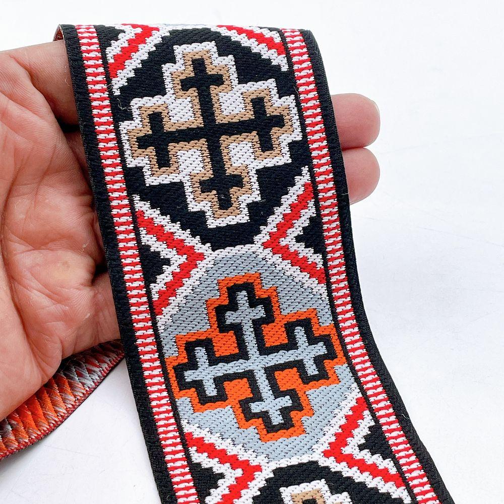 65mm Wide Tribal Jacquard Ribbon Trim - Colorful Geometric Tapestry Border for Bag Straps and Apparel, shown on white cotton