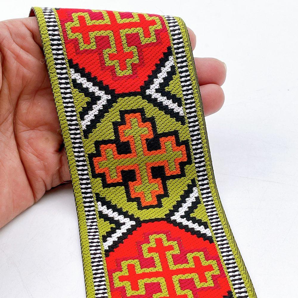 65mm Wide Tribal Jacquard Ribbon Trim - Colorful Geometric Tapestry Border for Bag Straps and Apparel, shown on white cotton